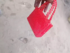 Un Petit Trousse Fait À Base De Perle Très Cool