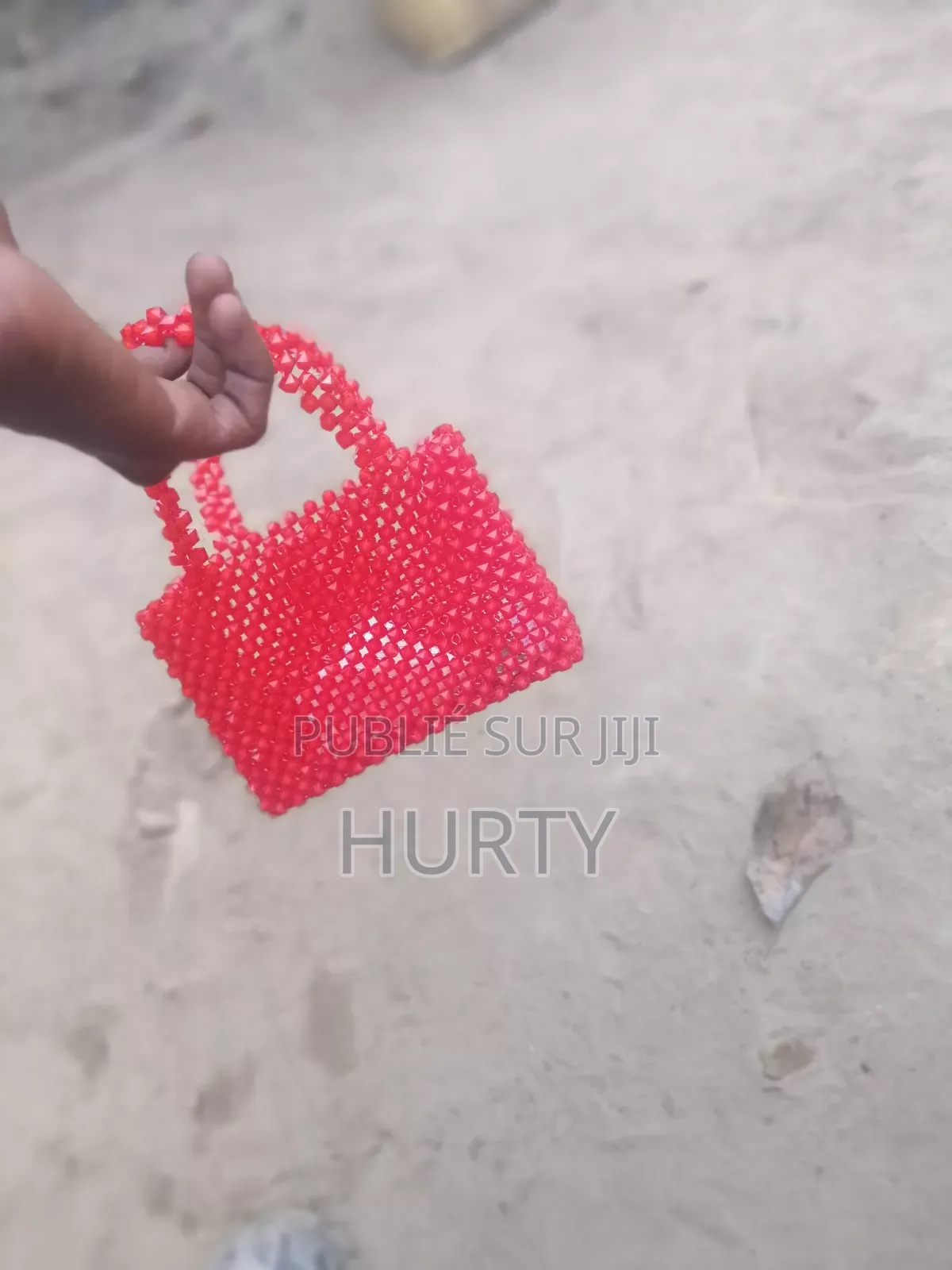 Un Petit Trousse Fait À Base De Perle Très Cool