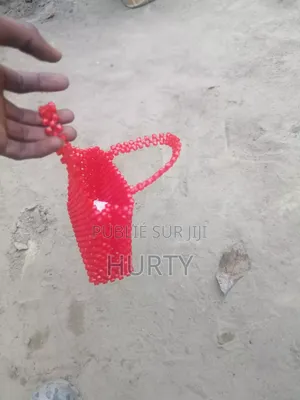 Un Petit Trousse Fait À Base De Perle Très Cool