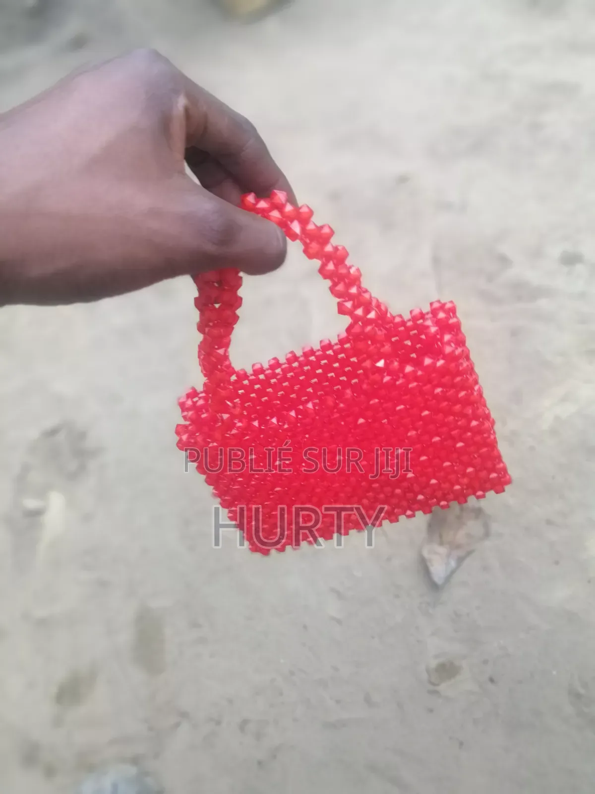 Un Petit Trousse Fait À Base De Perle Très Cool