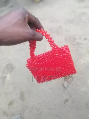 Un Petit Trousse Fait À Base De Perle Très Cool