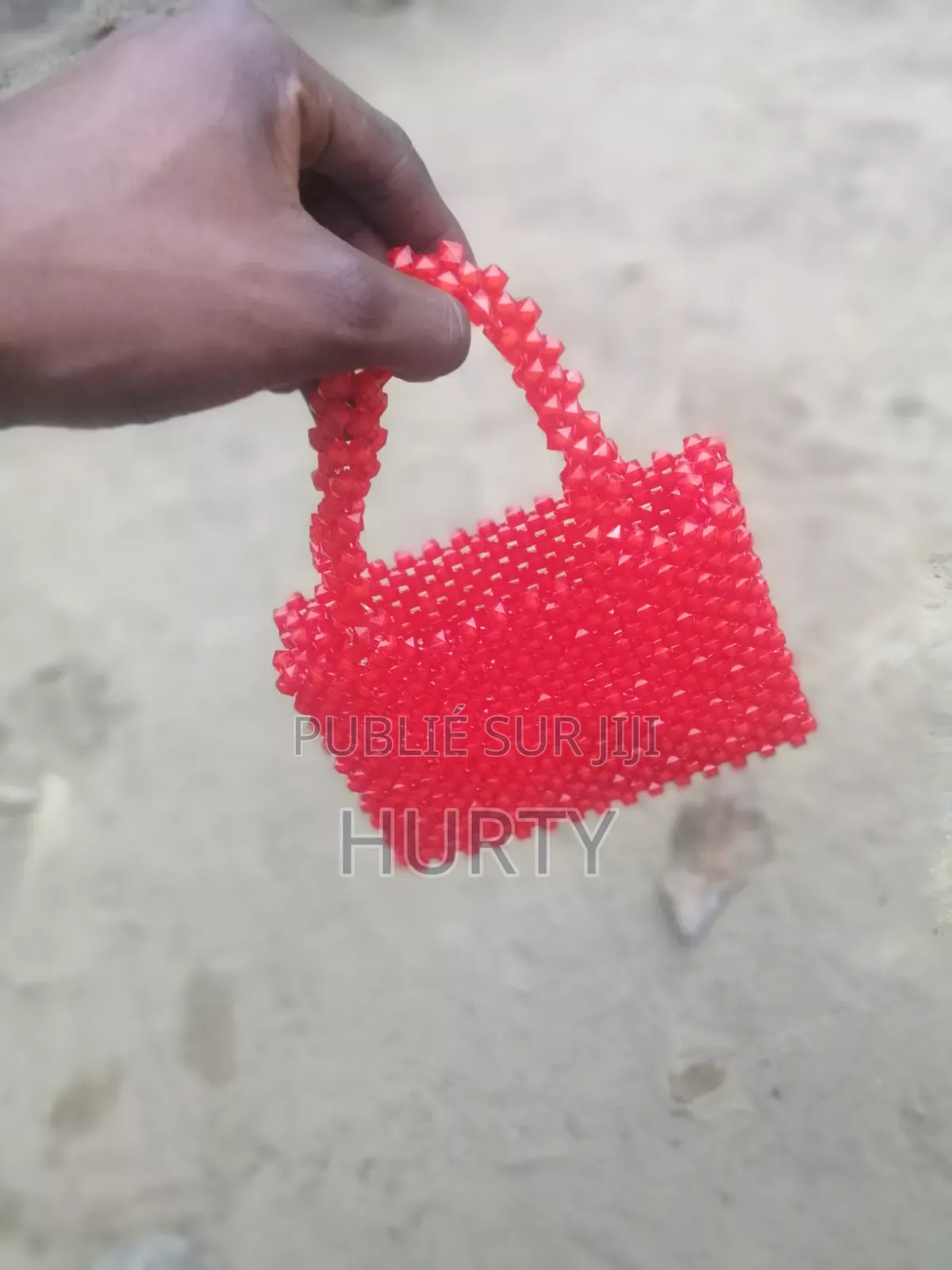Un Petit Trousse Fait À Base De Perle Très Cool