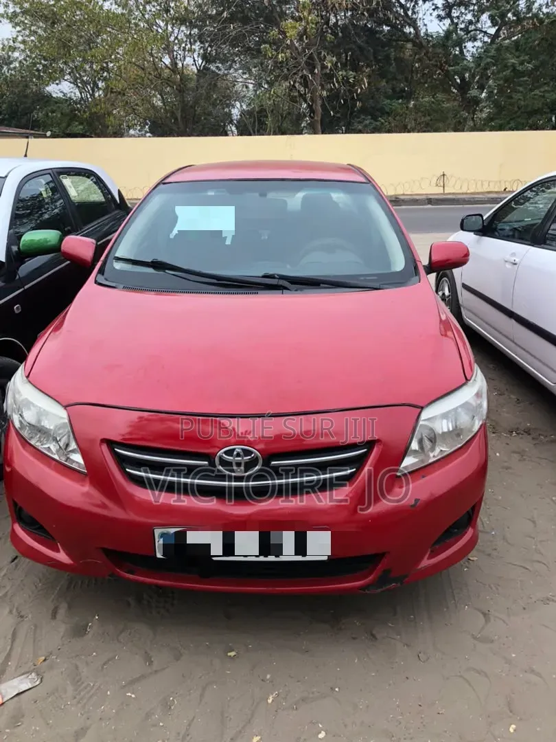 Toyota Corolla 2011 Rouge