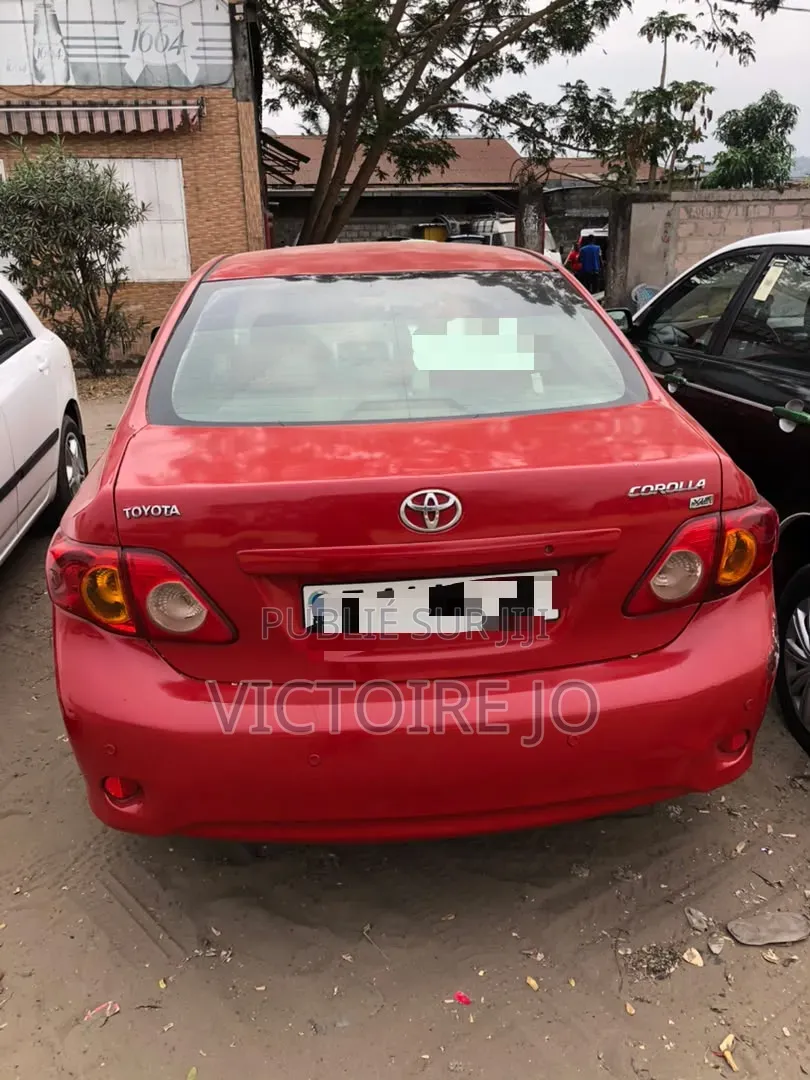 Toyota Corolla 2011 Rouge