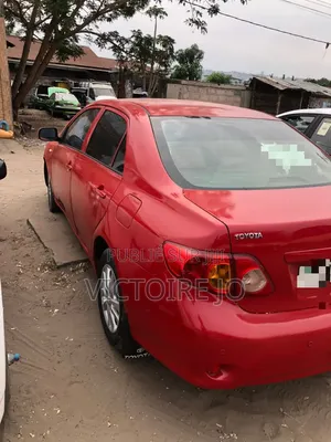 Toyota Corolla 2011 Rouge