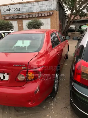 Toyota Corolla 2011 Rouge