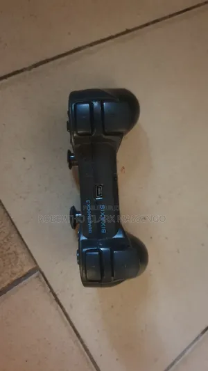 Manette Ps3 a Vendre + Cable De Connexion/Charge