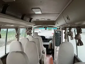 Toyota Coaster 2021 Blanc