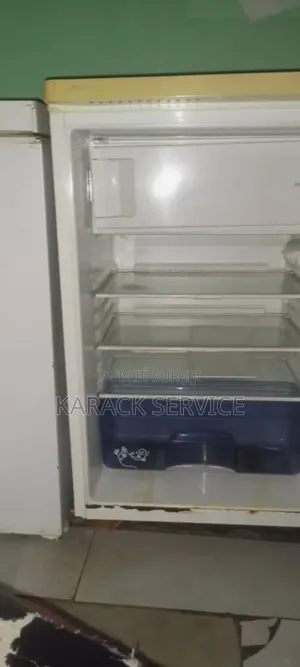 Réfrigérateur Encore en Bon État