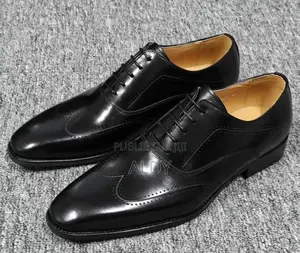 Chaussure D’Hommes