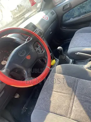 Toyota Corolla L 4dr Sedan (1.8L 4cyl 6M) 2014 Rouge